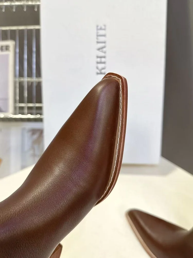 khaite khaite pointed toe pleated boots